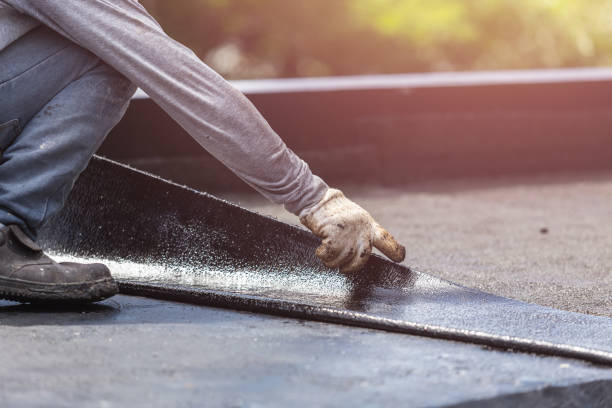 Professional Basement Waterproofing technician working in Grandview, WA